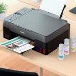 Canon PIXMA G2420 - Imprimante à réservoirs d'encre couleur rechargeables   - impression, copie, numérisation, wifi - 9 ppm (Noir) 5ppm (couleur) -  Noir 12.000 pages,  couleur 7700 pages en une seule recharge